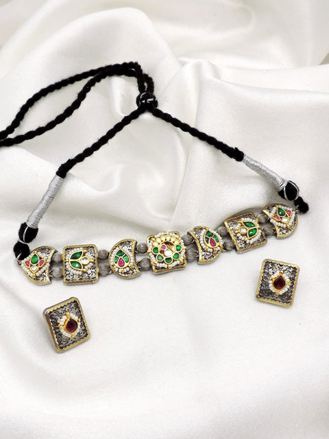 Oxidized vintage dual-tone kundan necklace set with colorful stones, pearl detailing and matching earrings by joyrias