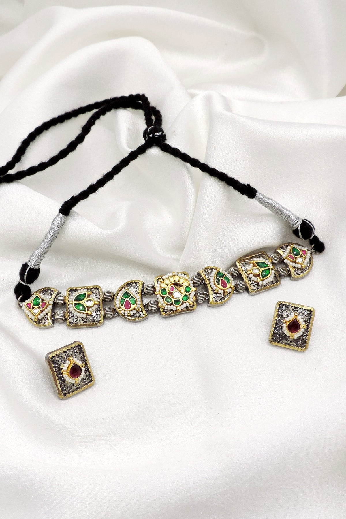 Oxidized vintage dual-tone kundan necklace set with colorful stones, pearl detailing and matching earrings by joyrias