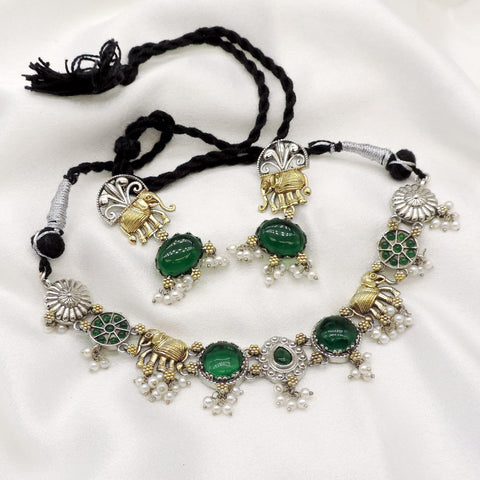 Oxidized elephant green stone pearl necklace set with antique silver-gold detailing and matching earrings by joyrias