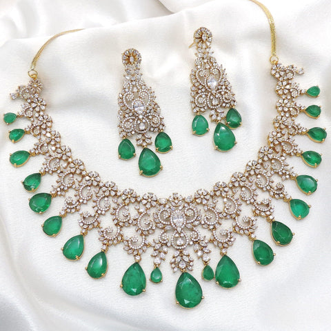 Emerald teardrop bridal necklace set by Joyrias
