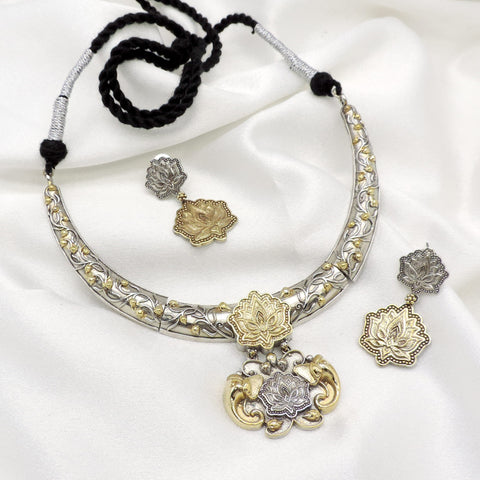 Oxidized dual-tone lotus floral necklace set with matching earrings by joyrias