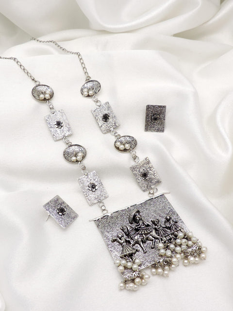 Oxidized silver Krishna Radha pearl necklace set with matching earrings by joyrias