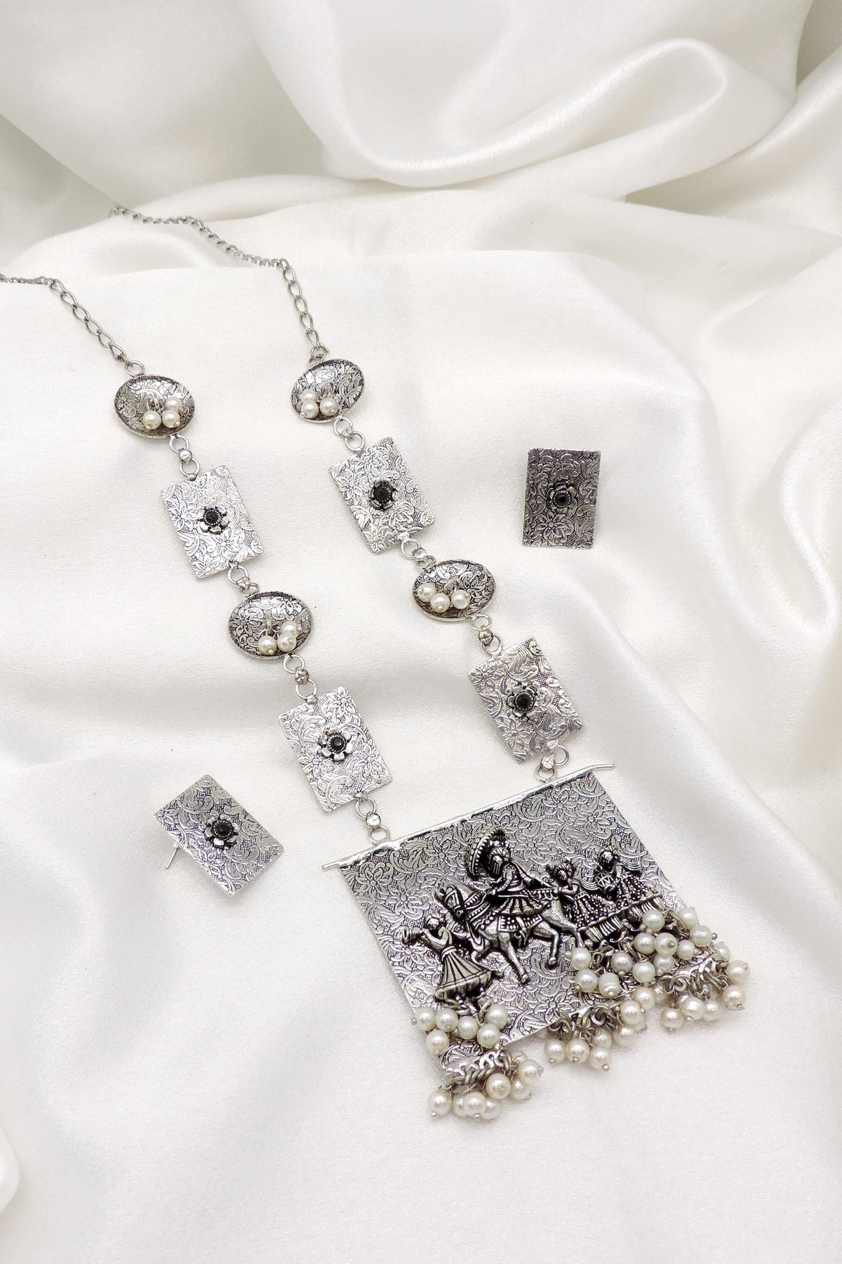 Oxidized silver Krishna Radha pearl necklace set with matching earrings by joyrias
