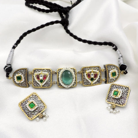 Oxidized dual-tone green stone pearl necklace set with matching earrings by joyrias