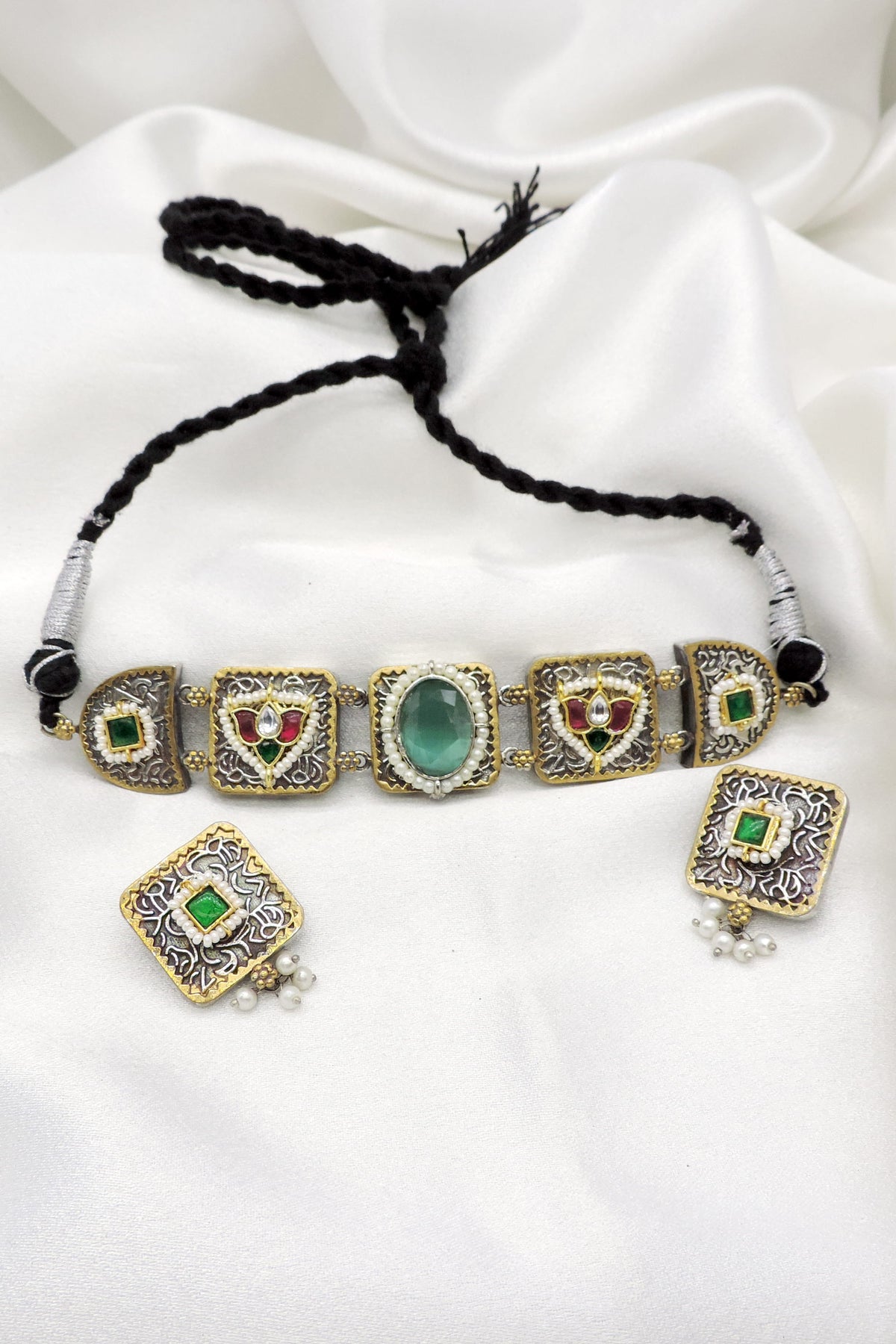 Oxidized dual-tone green stone pearl necklace set with matching earrings by joyrias