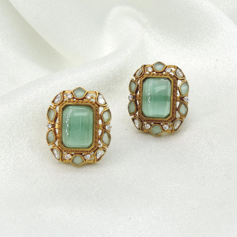 Mint Green Cat Eye Stud Earrings by Joyrias