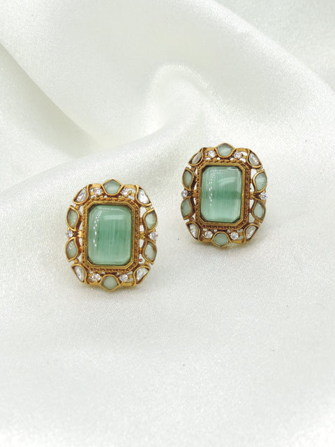 Mint Green Cat Eye Stud Earrings by Joyrias