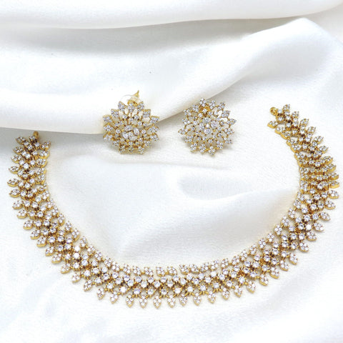 Gold-toned floral CZ necklace set with matching earrings by joyrias