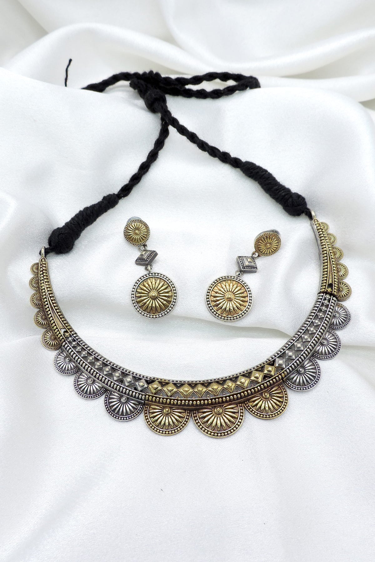 Oxidized dual-tone floral choker set with matching earrings by joyrias