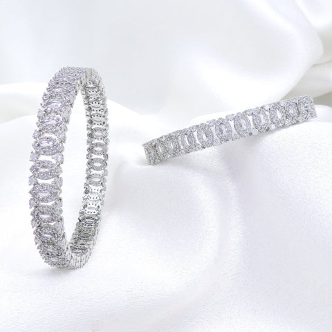 Majestic silver-toned AD bangle set with intricate linked design by joyrias