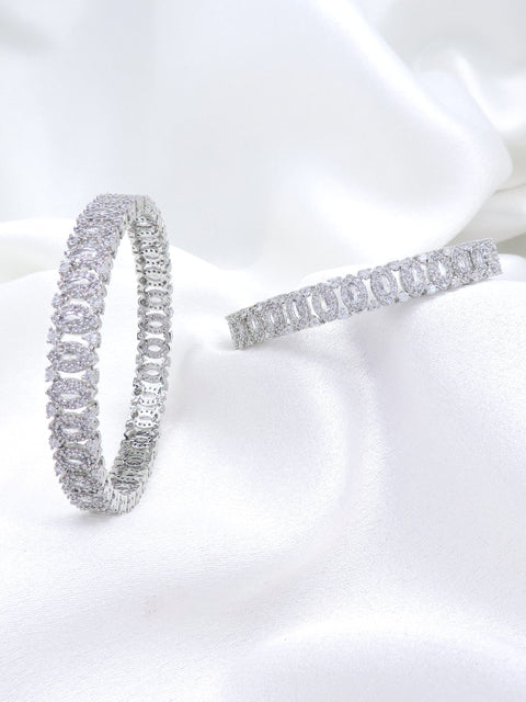 Majestic silver-toned AD bangle set with intricate linked design by joyrias