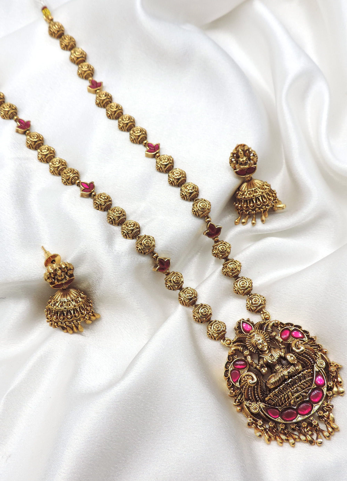 Temple Lakshmi pink stone long necklace set with matching jhumka earrings by joyrias