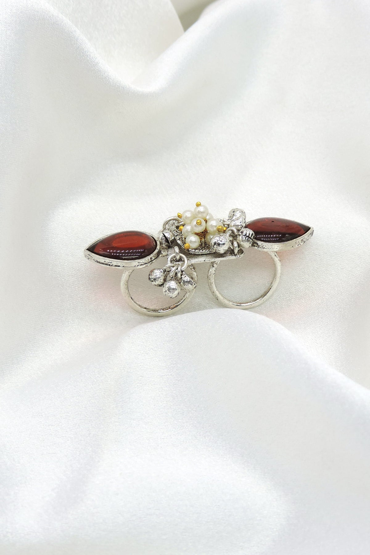 Oxidized silver red stone pearl double finger ring by joyrias
