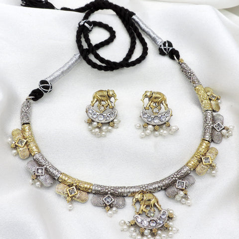 Oxidized dual-tone elephant pearl necklace set with matching earrings by Joyrias
