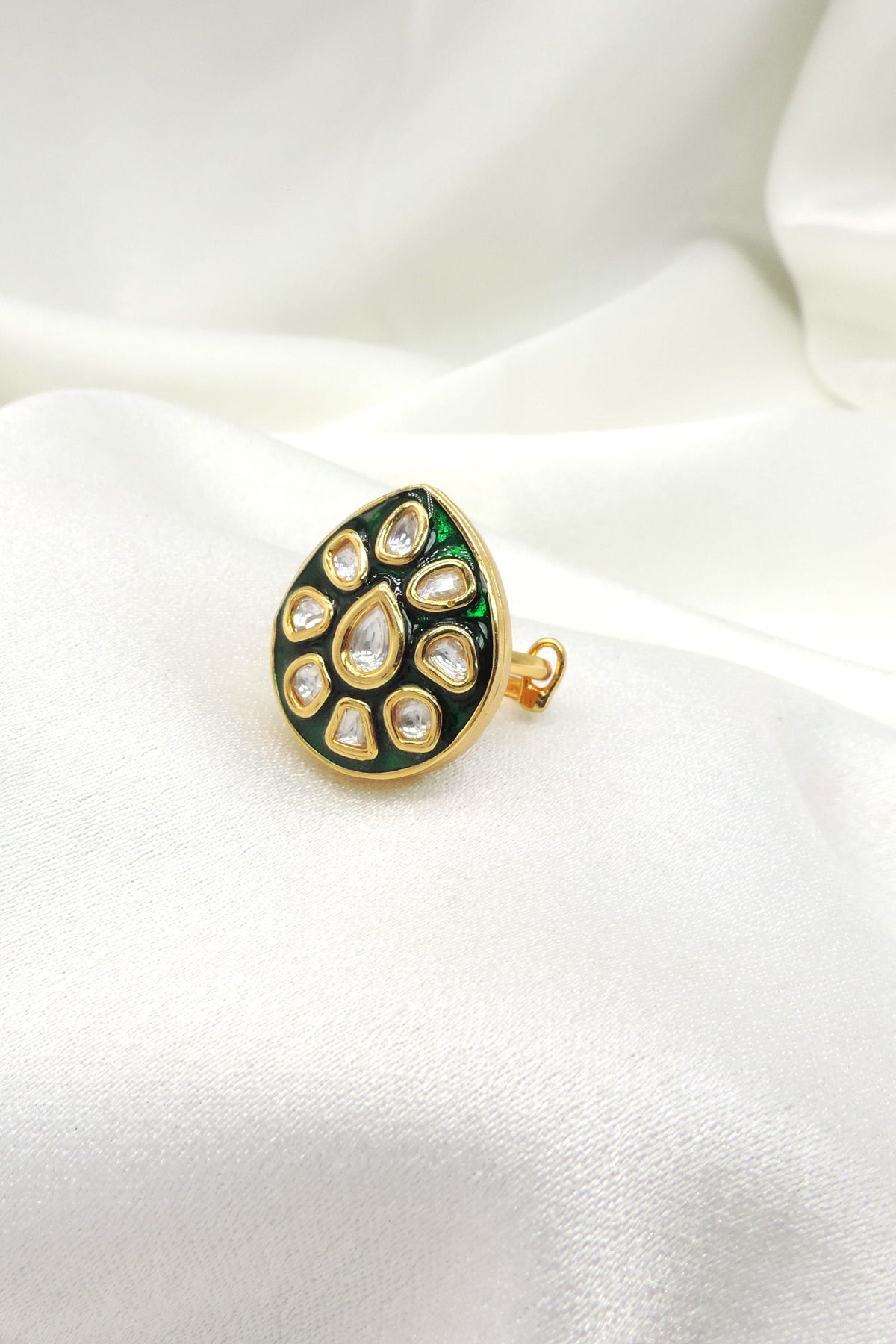 Emerald kundan teardrop ring by Joyrias
