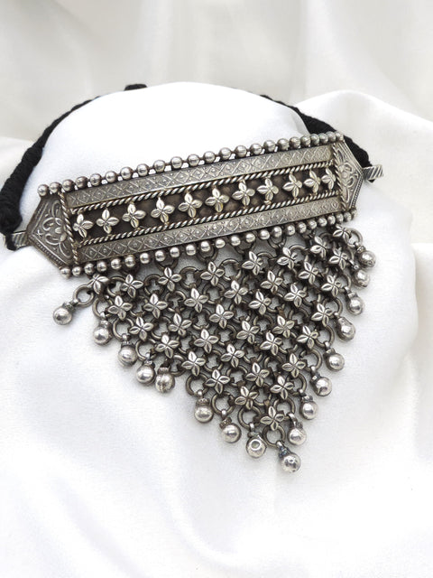 Oxidized floral cascading choker with intricate flower detailing and hanging accents by joyrias