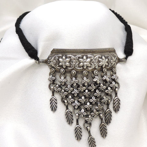 Oxidized floral cascading choker with intricate floral detailing by joyrias