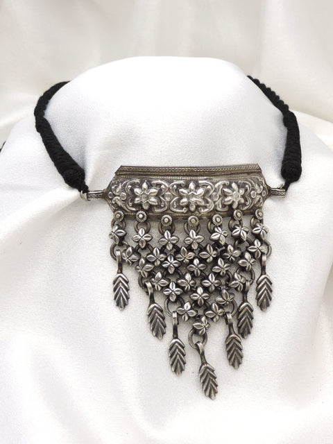 Oxidized floral cascading choker with intricate floral detailing by joyrias