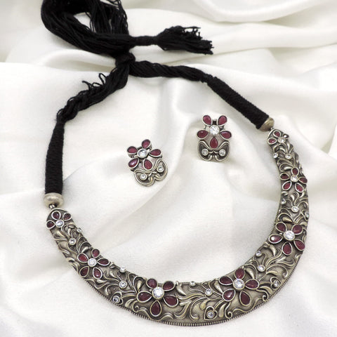Oxidized maroon floral carved choker set with matching petal earrings and black thread tie by joyrias