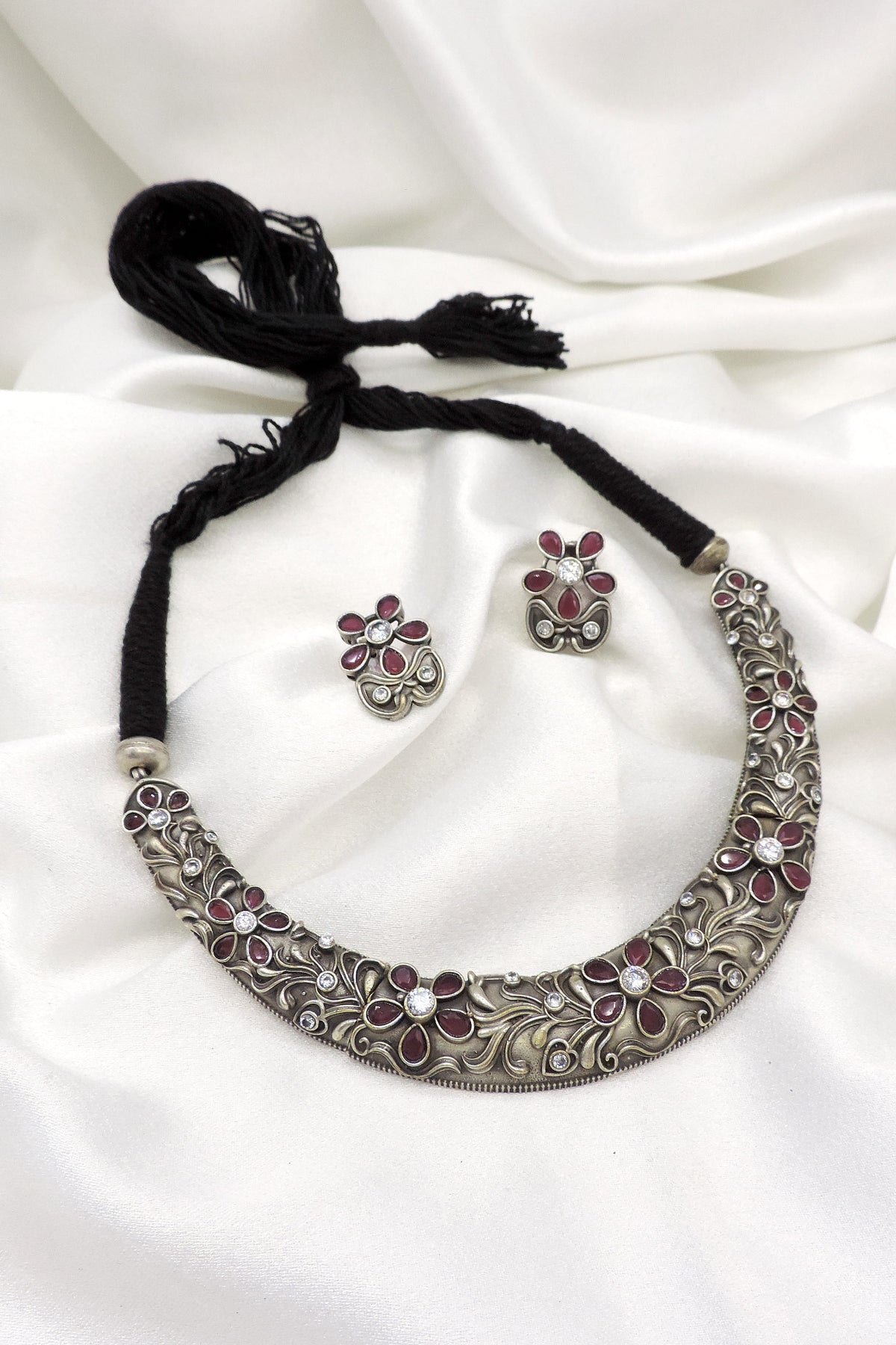 Oxidized maroon floral carved choker set with matching petal earrings and black thread tie by joyrias