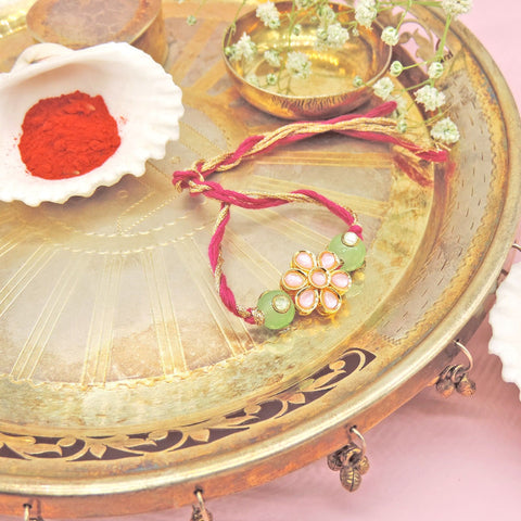 Pink Floral Bhaiya Rakhi by Joyrias