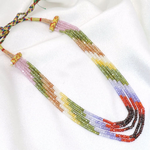 Pastel rainbow layered beaded necklace with boho tassel detailing