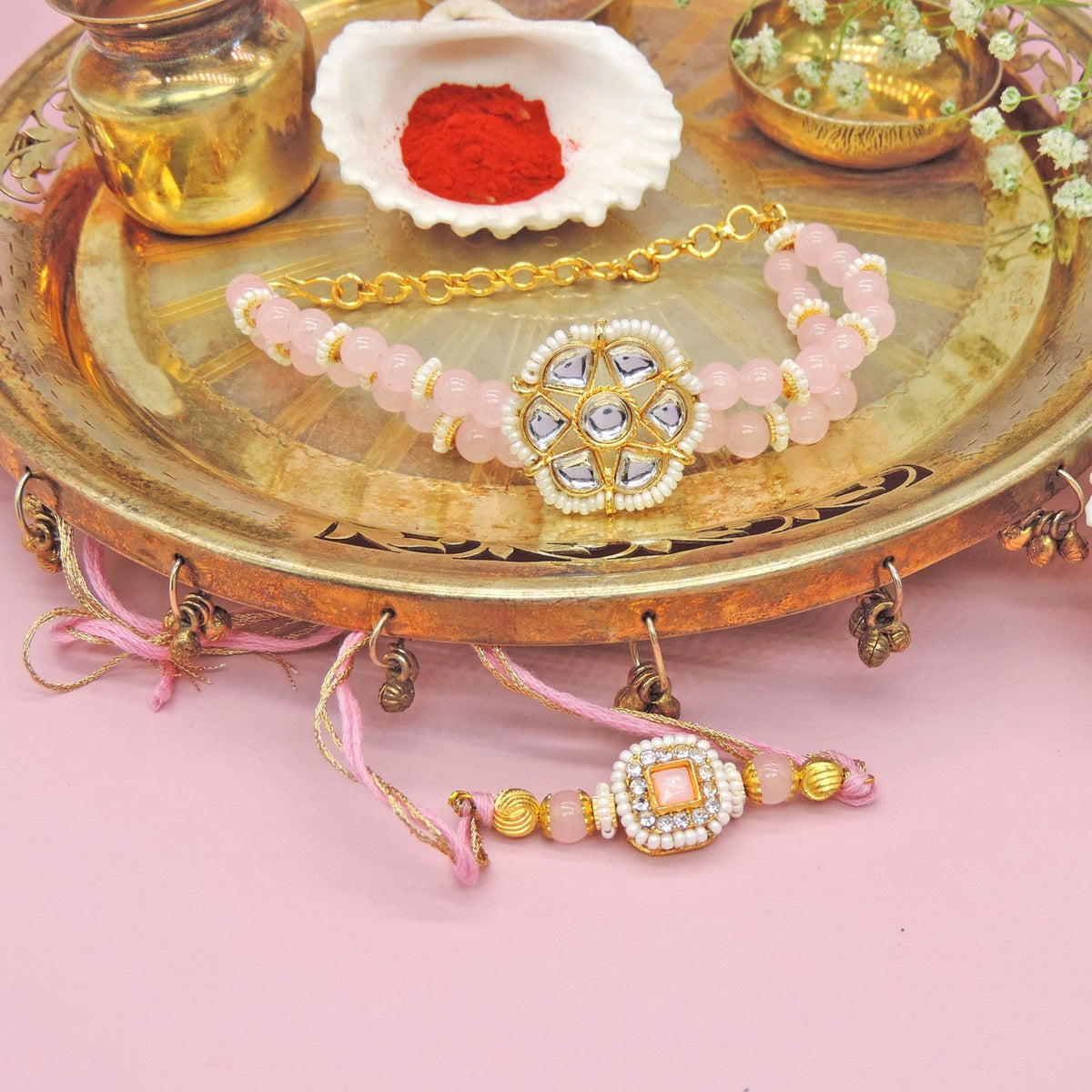 Blush Kundan Bhaiya Bhabhi Rakhi Set by Joyrias