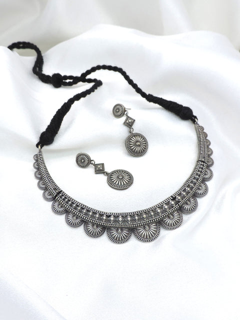 Oxidized silver floral medallion necklace set with earrings by joyrias