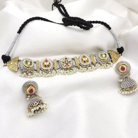Oxidized dual-tone kundan pearl choker set with colorful stones and matching jhumka earrings by joyrias