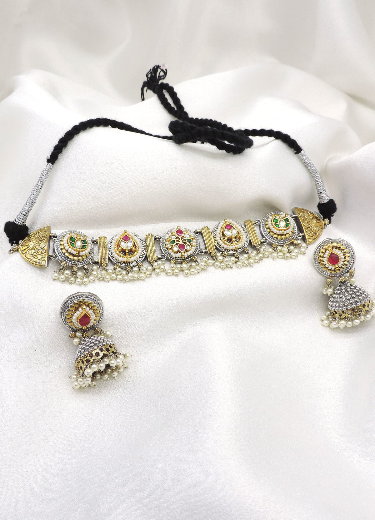 Oxidized dual-tone kundan pearl choker set with colorful stones and matching jhumka earrings by joyrias