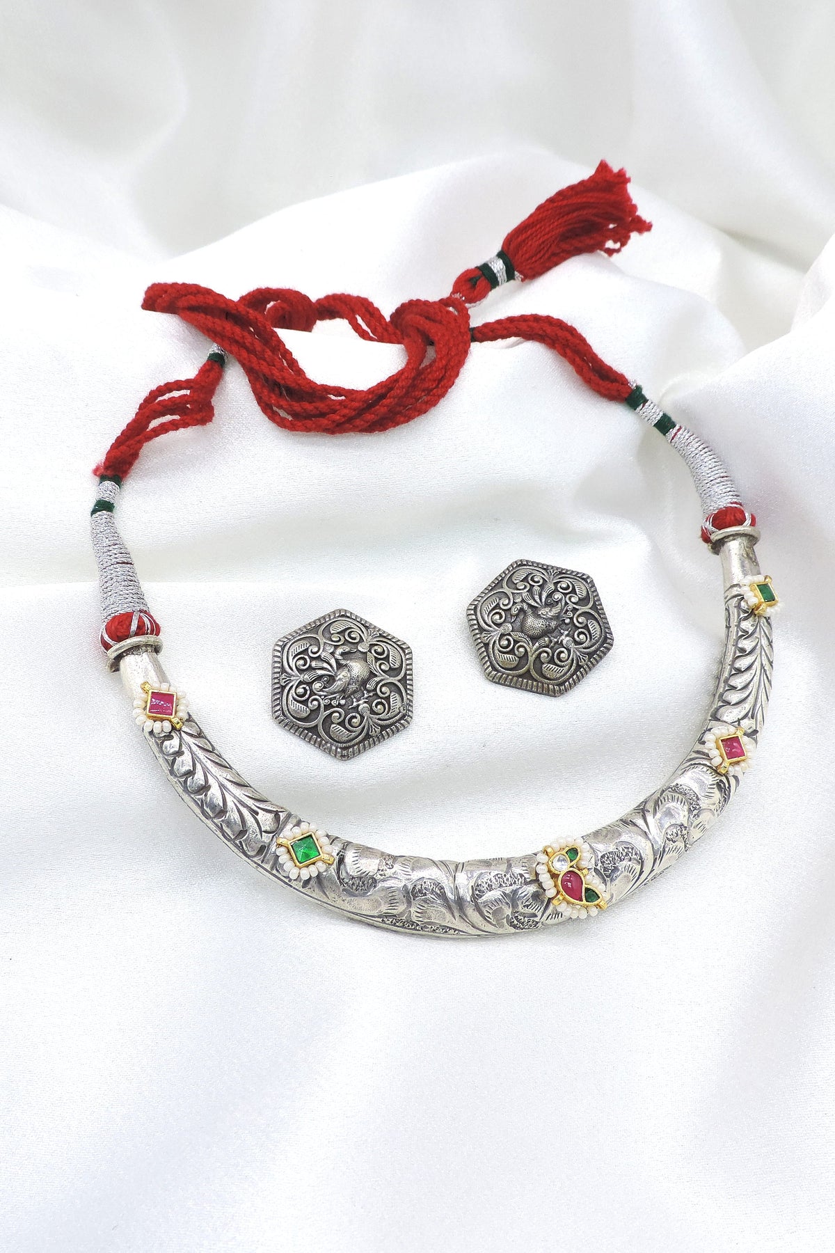 Oxidized multicolor traditional Hasli necklace set with matching earrings by Joyrias