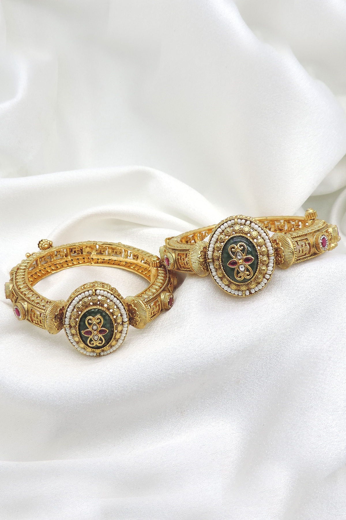 Heritage gold-toned black red stone bangle set with pearl detailing by joyrias