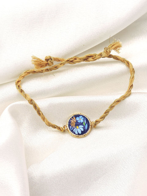 Blue Floral Bhaiya Rakhi by Joyrias