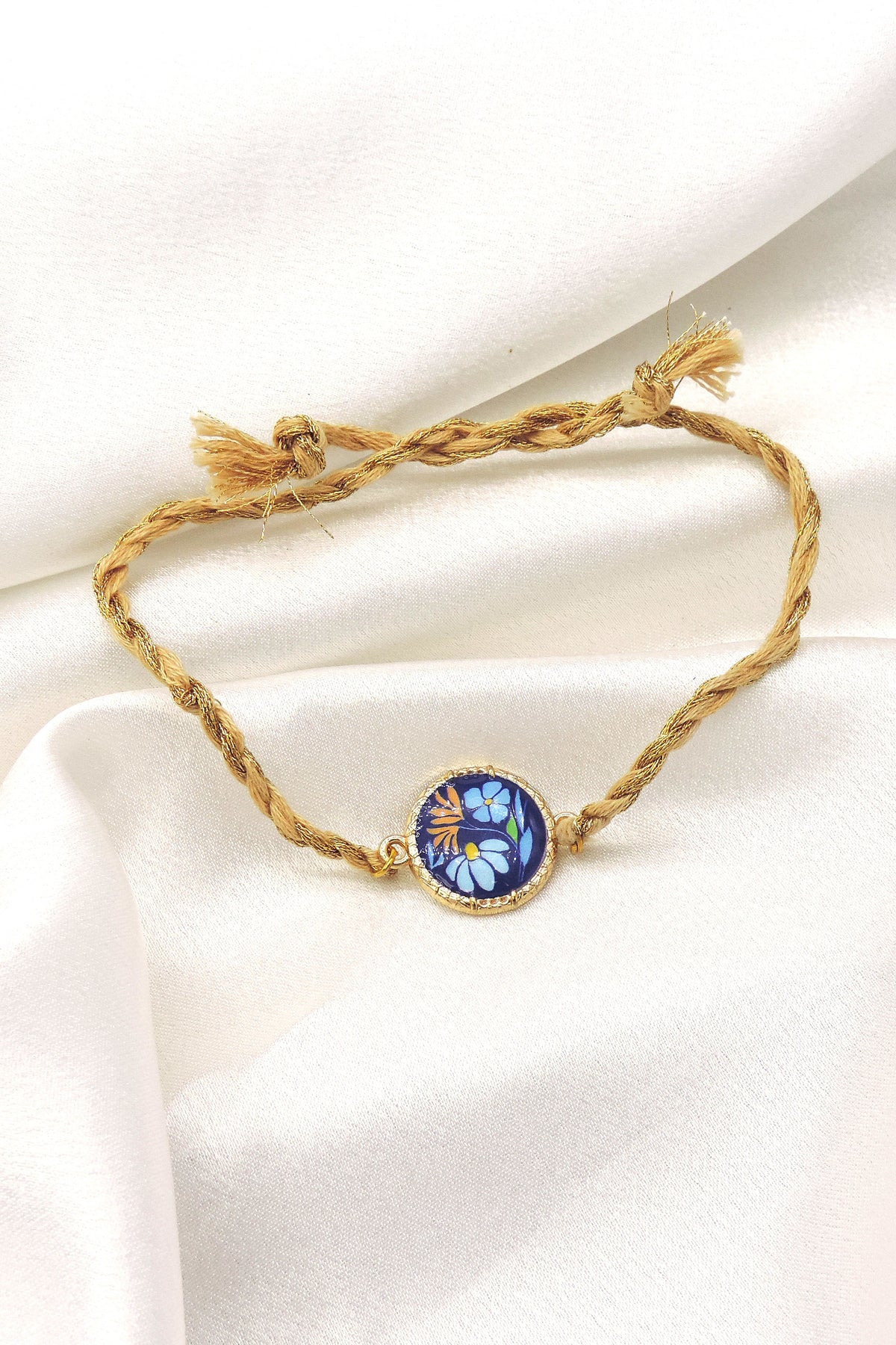 Blue Floral Bhaiya Rakhi by Joyrias