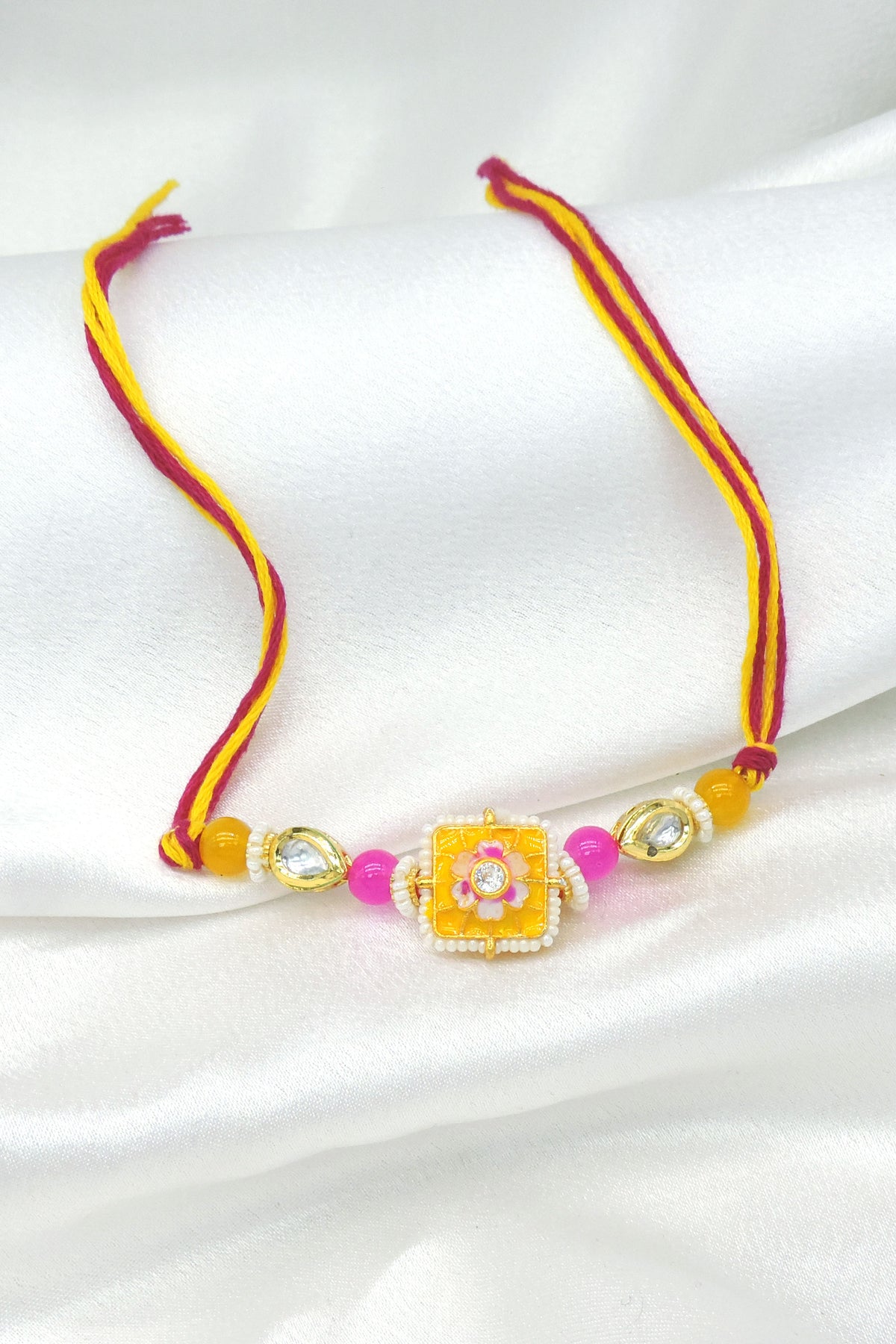 Floral Meena Bhaiya Rakhi by Joyrias