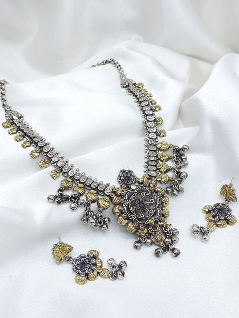 Oxidized dual-tone floral medallion necklace set with blue stones and ghungroo details by joyrias
