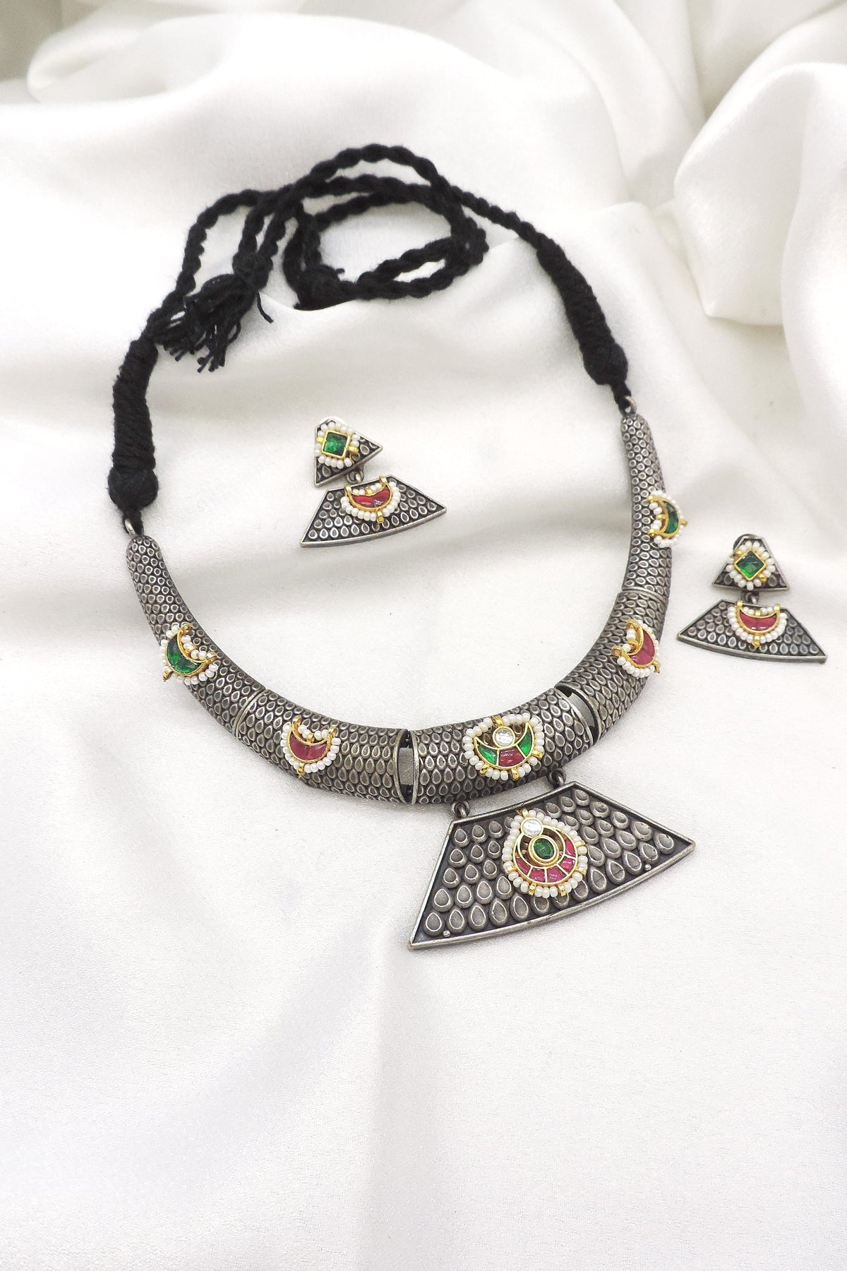 Oxidized dual-tone multicolor geometric Hasli choker set with matching earrings and pendant by joyrias