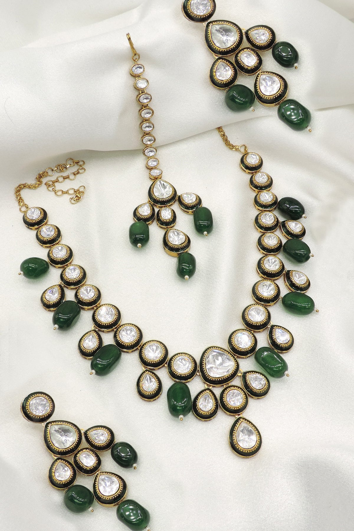 Emerald Green Kundan Necklace Set with Matching Earrings and Maang Tikka in Antique Gold Finish for Bridal and Wedding Wear