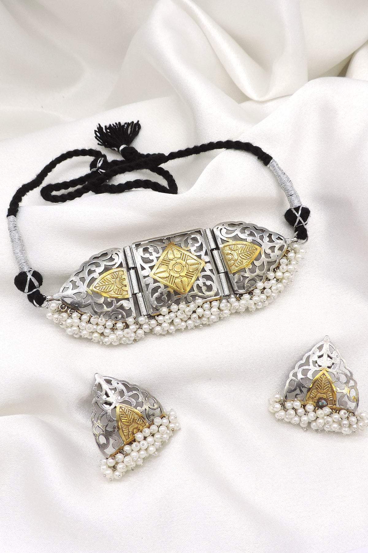 Oxidized dual-tone filigree pearl choker set with geometric detailing and matching earrings by joyrias