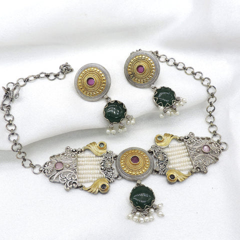 Oxidized dual-tone green stone pearl choker set with matching earrings by joyrias