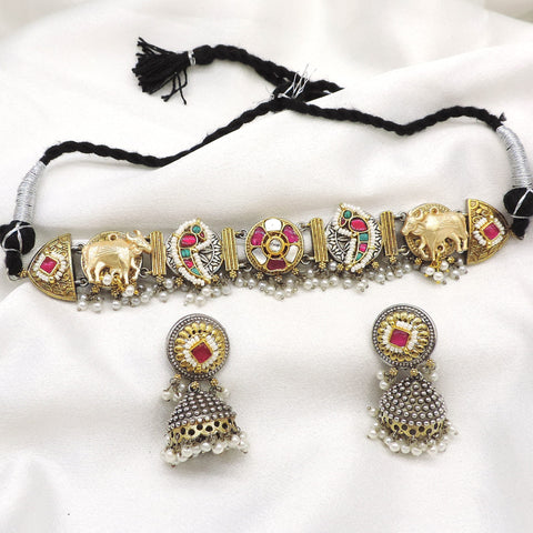 Oxidized dual-tone elephant Meenakari choker set with colorful stones, pearl detailing and matching jhumka earrings by joyrias