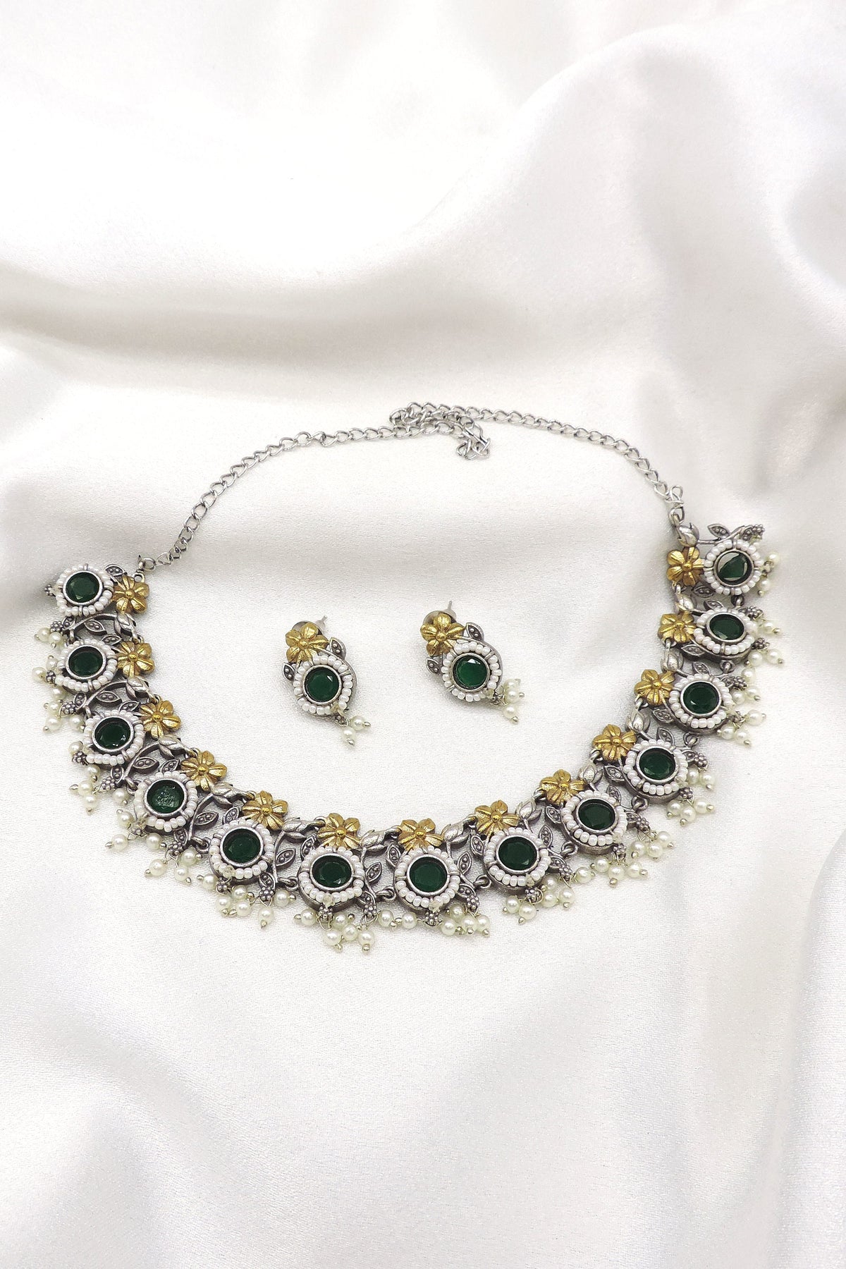 Oxidized dual-tone green floral pearl choker set with matching earrings by joyrias