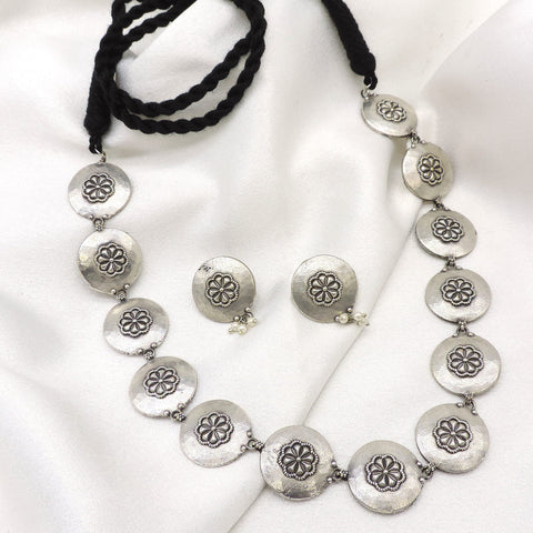 Oxidized silver floral coin choker set with pearl detailing and matching earrings by joyrias