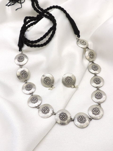 Oxidized silver floral coin choker set with pearl detailing and matching earrings by joyrias