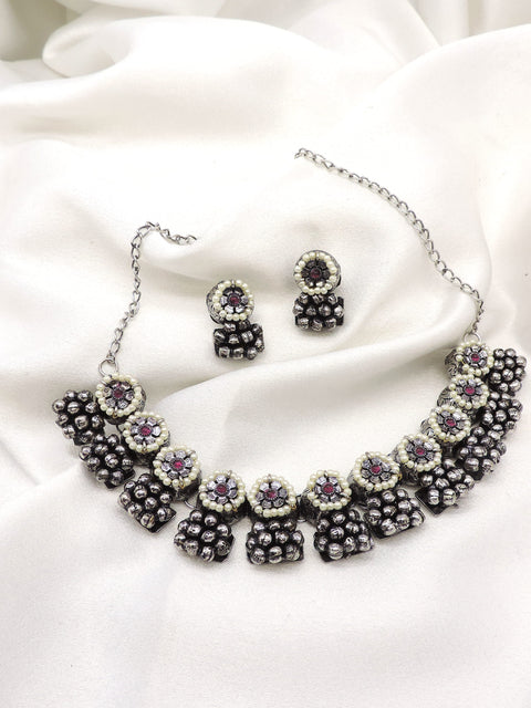 Oxidized black pearl floral choker set with matching earrings by joyrias