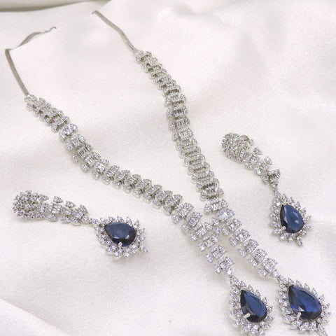 Silver-toned blue sapphire CZ necklace set with matching earrings by joyrias