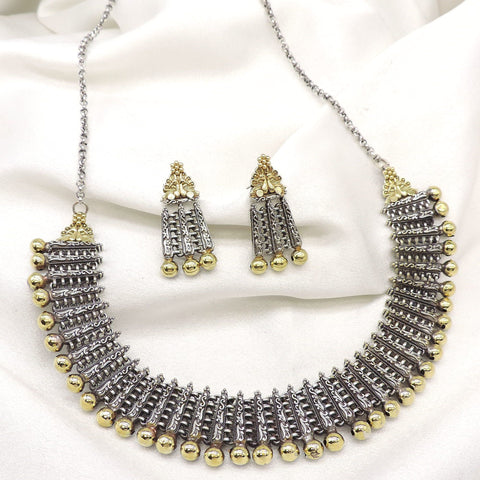 Oxidized dual-tone layered bead choker set with intricate silver detailing and matching earrings by joyrias