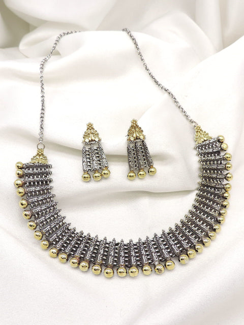 Oxidized dual-tone layered bead choker set with intricate silver detailing and matching earrings by joyrias