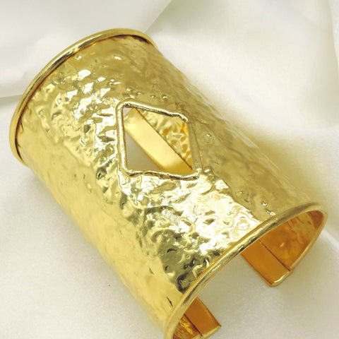 Hammered gold cuff bracelet by Joyrias
