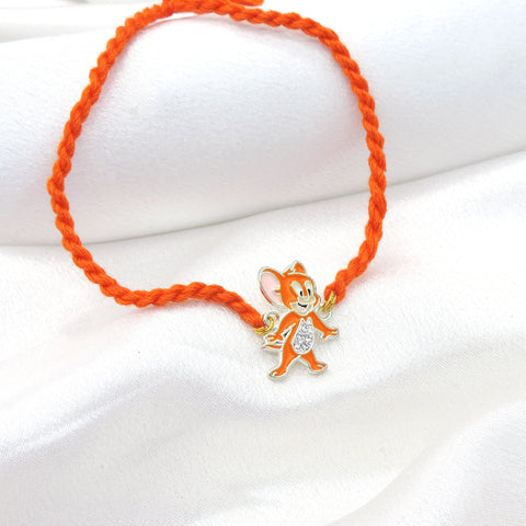 Jerry kids rakhi with orange enamel charm and CZ detailing by Joyrias
